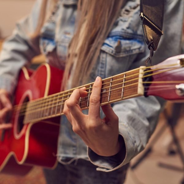 woman-playing-electric-guitar.jpg